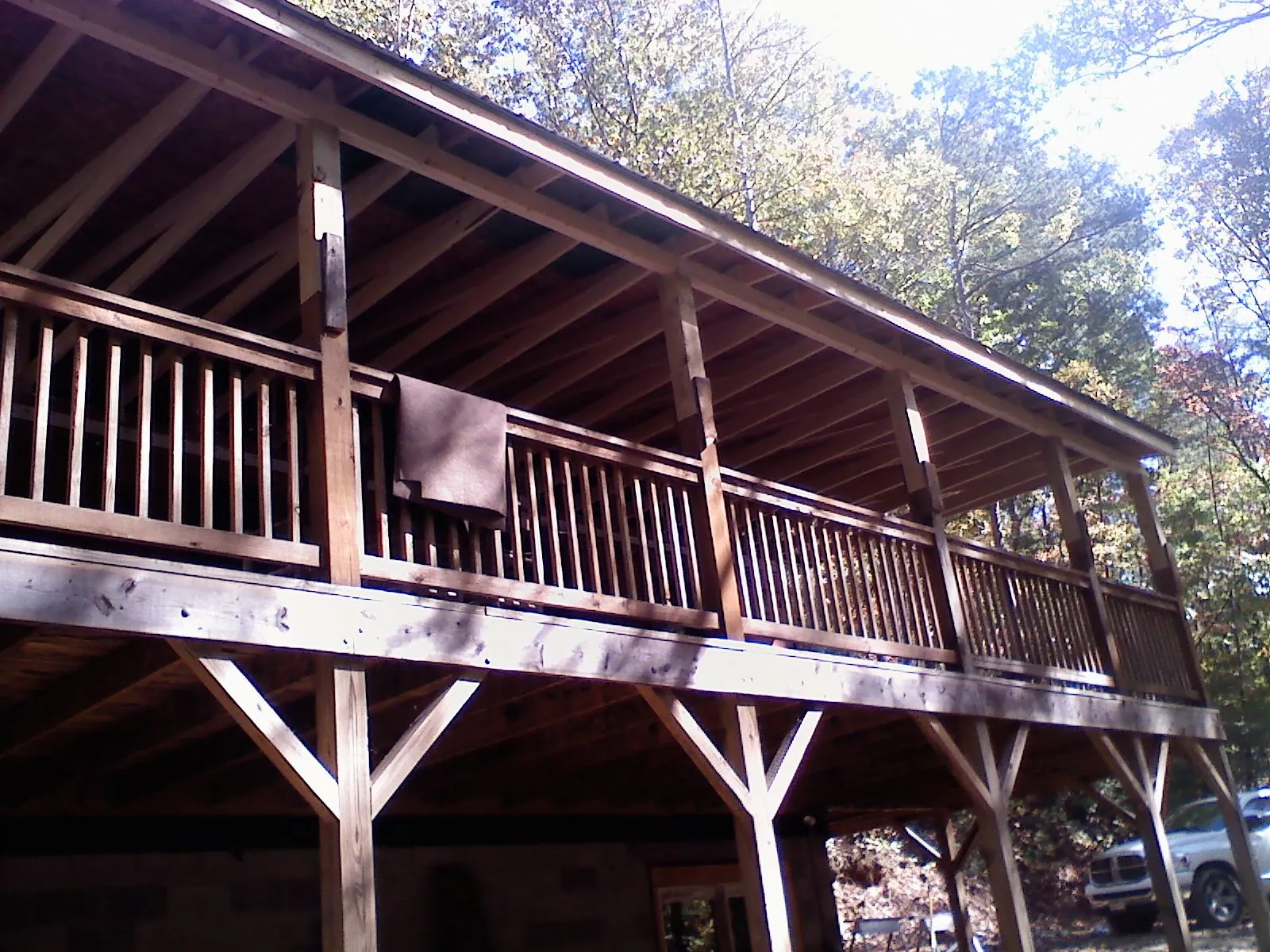 Timber framing under a new elevated porch and deck — Roof Leak Repair in Elk Grove Village by Roofing Brothers